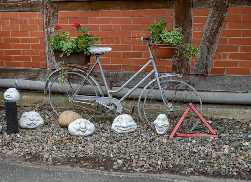 Silver bicycle as decopration in front of a house in the Rundlingsdorf Meuchelfitz