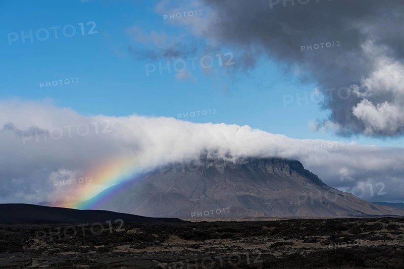 Rainbow and clouds at the table volcano Heroubreio or Herdubreid