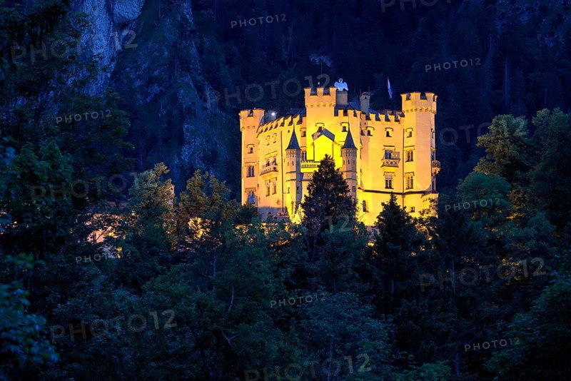 Illuminated castle Hohenschwangau at night