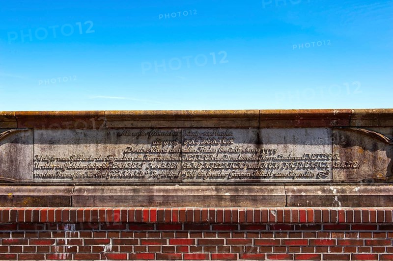 Historical inscription on the base of the old siet gate