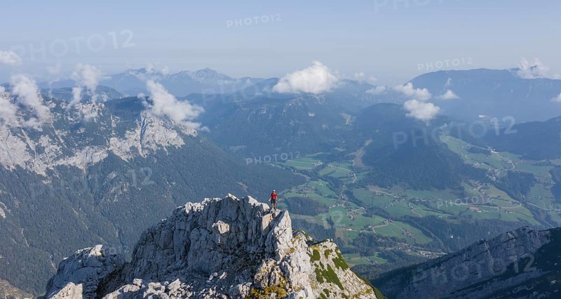 Hiker on a summit on the way to the Hochkalter