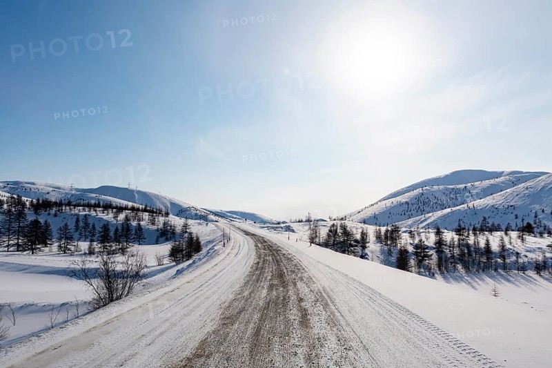 Snow covered mountains along the Road of Bones