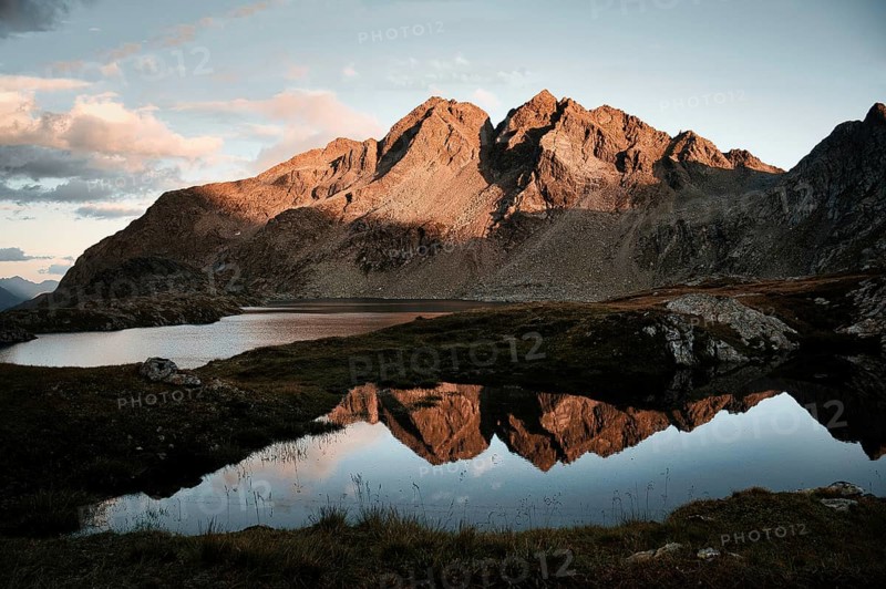 Sunset with mountains and reflection towards Obere Seescharte and Wangenitzsee