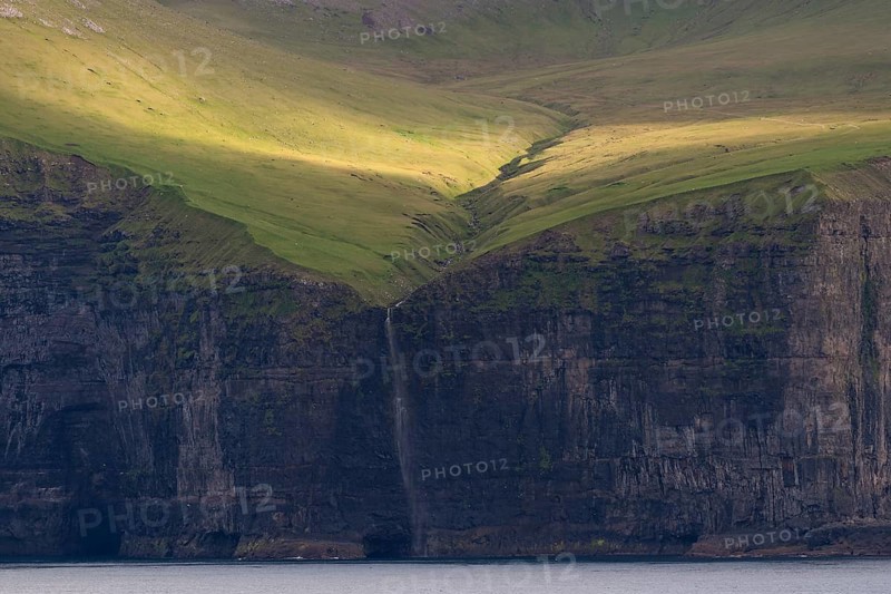 Waterfall falling over steep cliffs