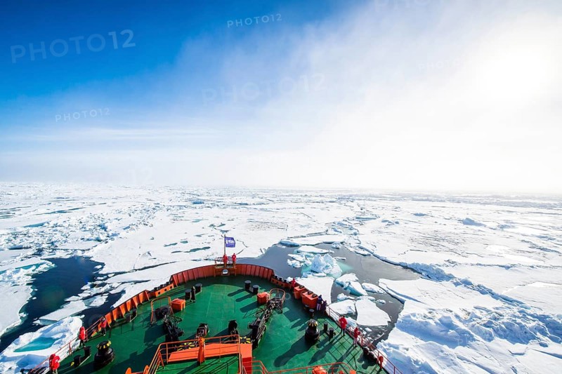 Fog bow or white rainbow in the ice around the North Pole