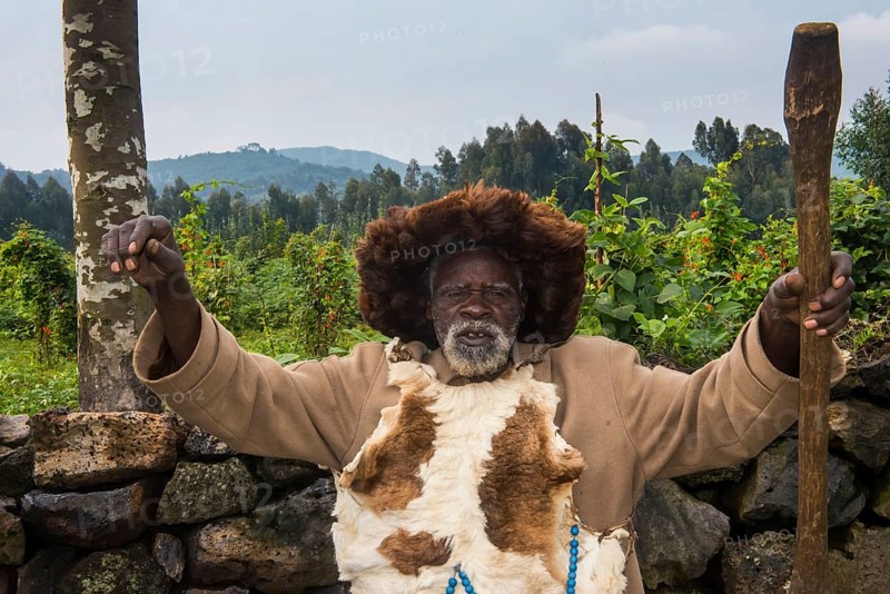 Old man preparing local herbs on a Ceremony of former poachers