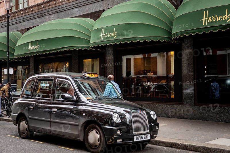 Black London Taxi outside the luxury department stores