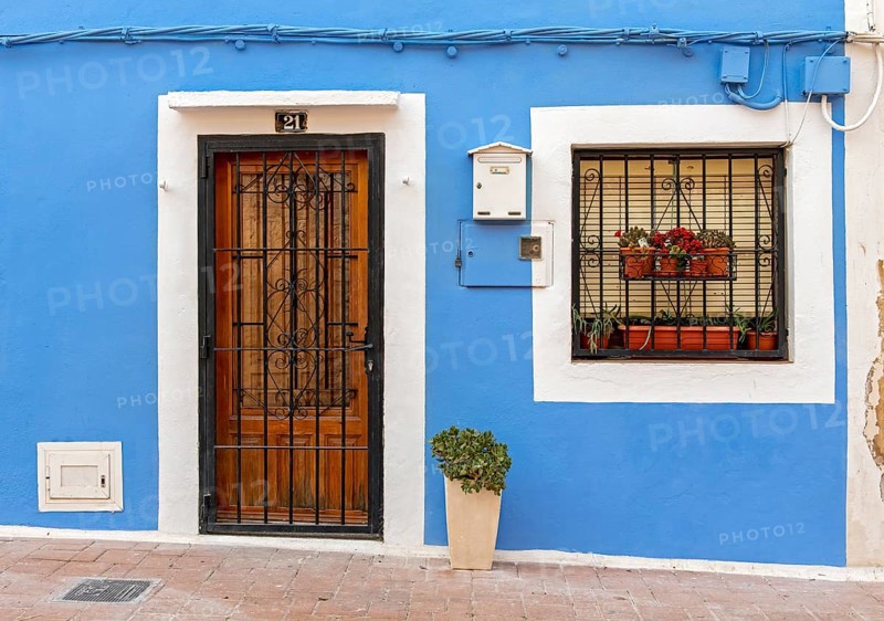 Close-up of door and window of blue fishermen's houses in Villajoyosa