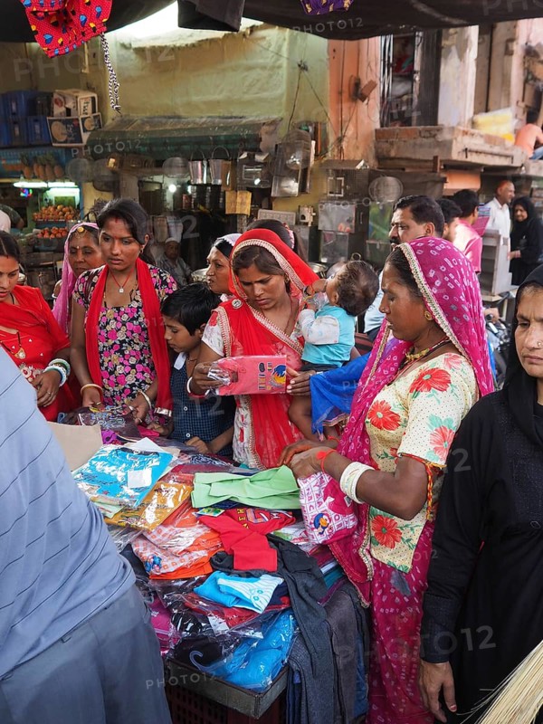 Customers check textiles