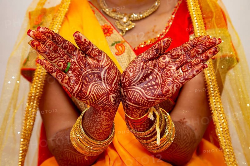 Hindu Bride's hand painted with mehndi on her wedding eve