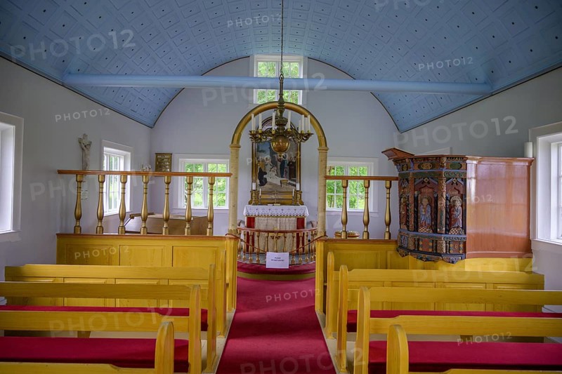 Church interior view looking towards the altar and pulpit