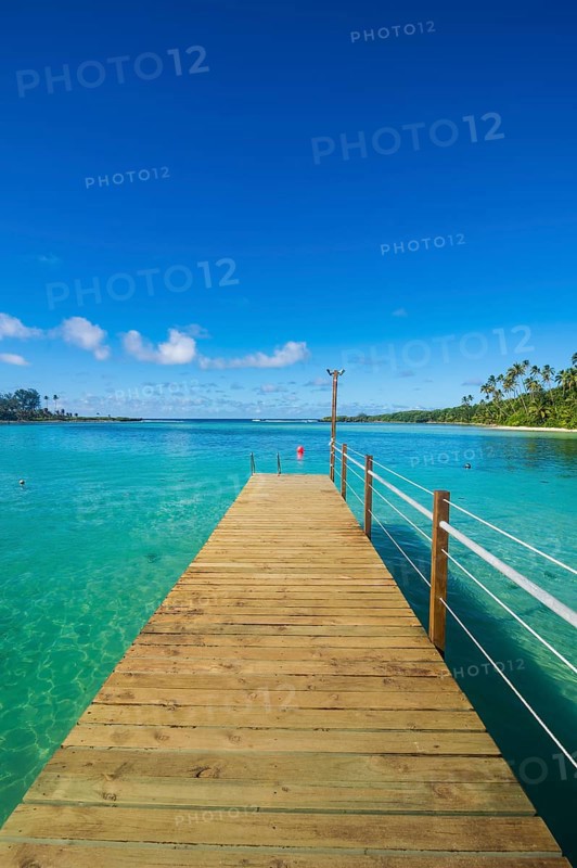 Pier in the turquoise waters of Muri beach