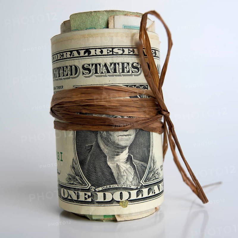 Roll of dollar banknotes