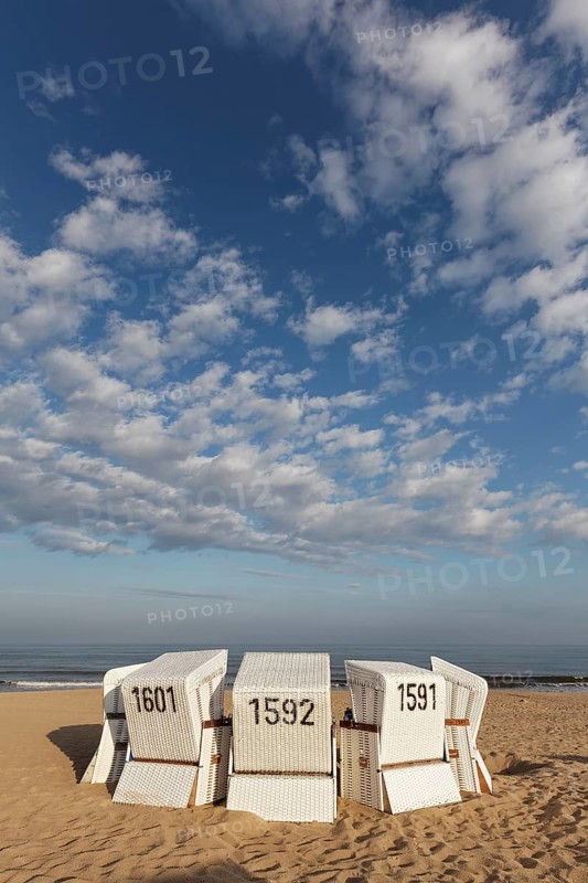 White beach chairs in the morning light