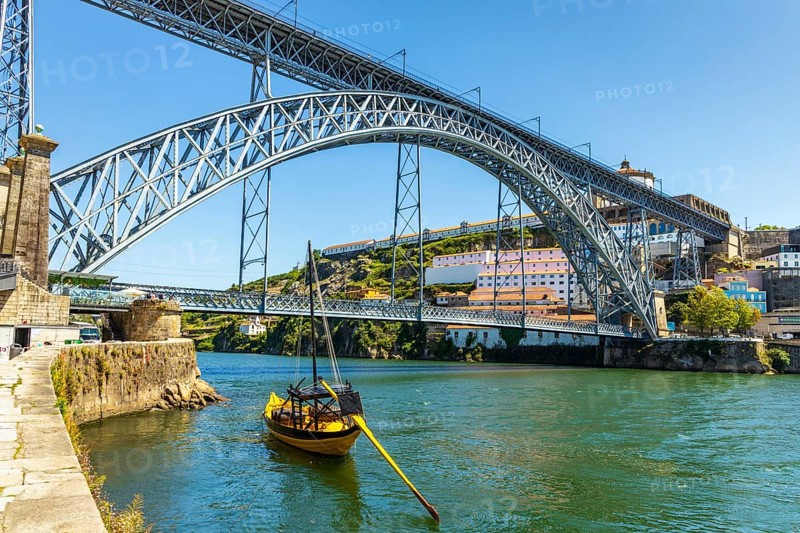 Beautiful iron Dom Luis I bridge over Douro river in Porto