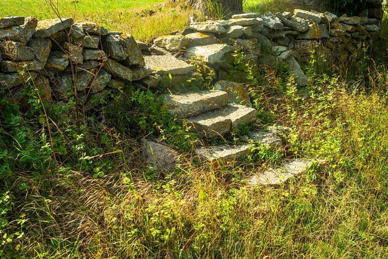 Stairway on an old abandoned stonewall in Gisloevshammar