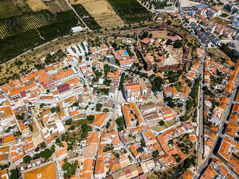 Aerial view of Silves with Moorish castle and historic cathedral