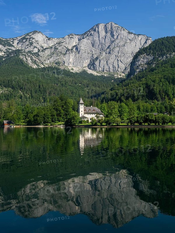 Grundlsee Castle against a mountain backdrop