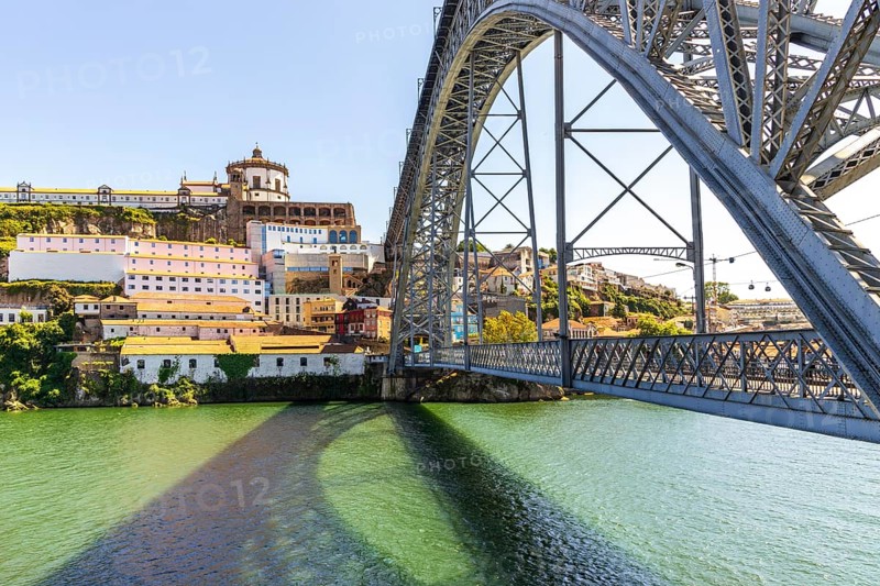 Beautiful iron Dom Luis I bridge over Douro river in Porto