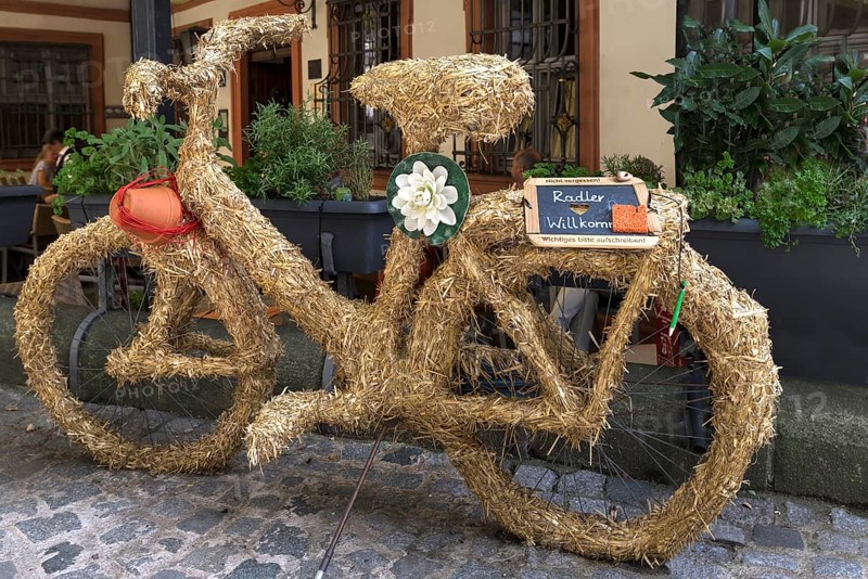 Bicycle wrapped in straw