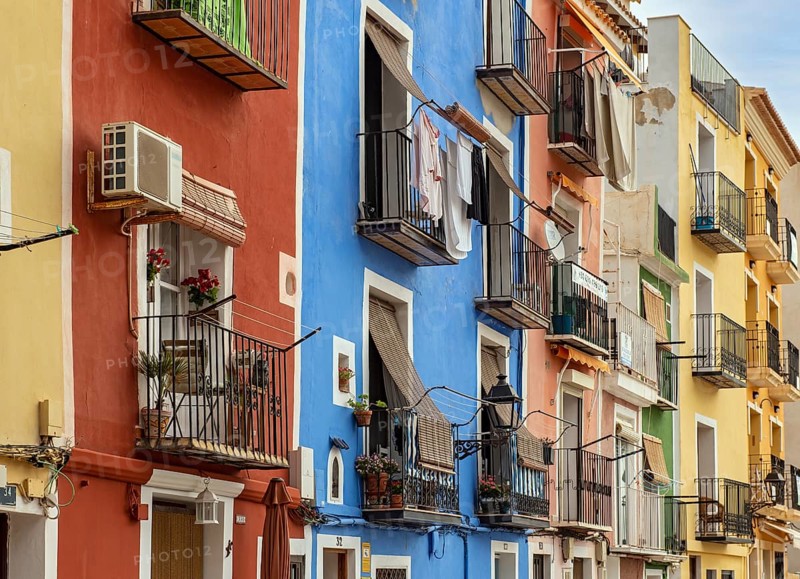 Close-up of colorful windows and balconies of fishermen's houses in Villajoyosa