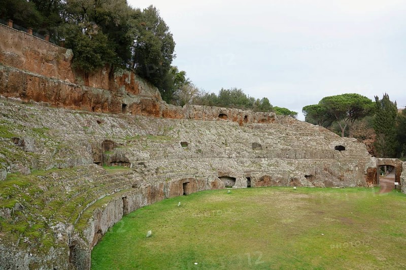 Roman amphitheatre carved out of the tufa
