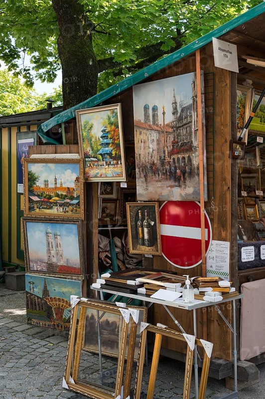 Sales stand with oil paintings and picture frames