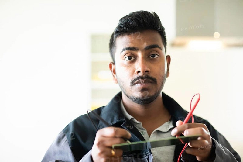 Student in an internship at the university with work equipment