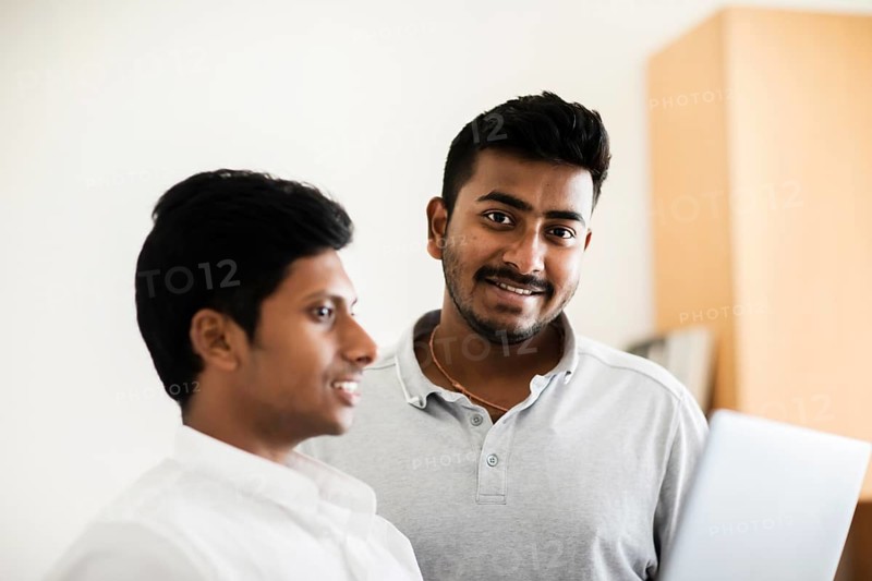 Students with laptop at the university