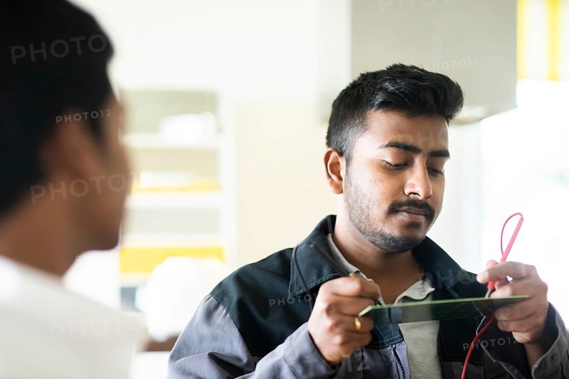 Students in an internship at the university with work equipment