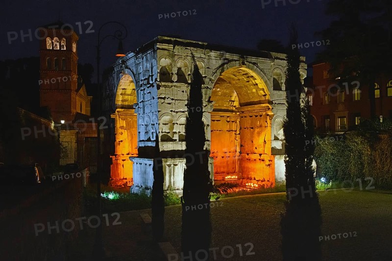 Illuminated Arch of Janus at night