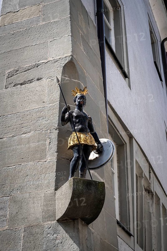Facade figure of a half-naked black African in the old town of Constance