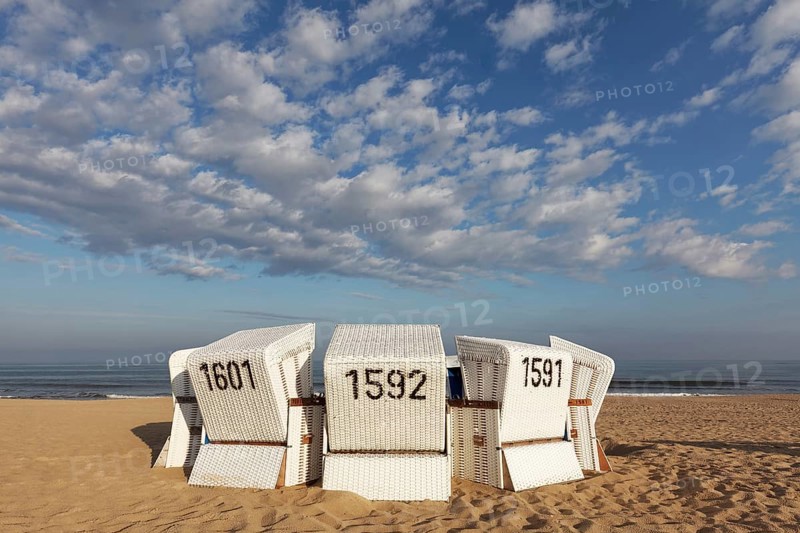 White beach chairs in the morning light