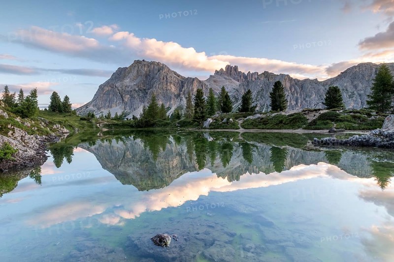 Morning atmosphere at the lake Lago de Limides and Tofana di Rozes