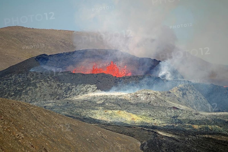 Active volcano with lava fountains