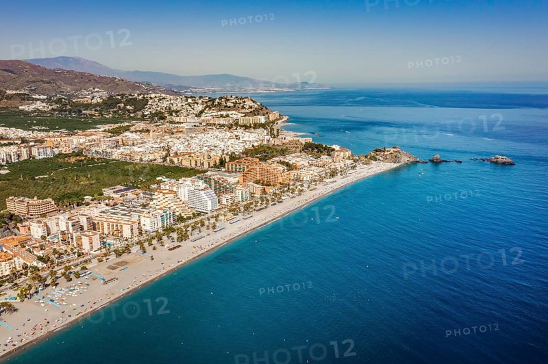 Aerial view of touristic coast in Almunecar by Mediterranean Sea