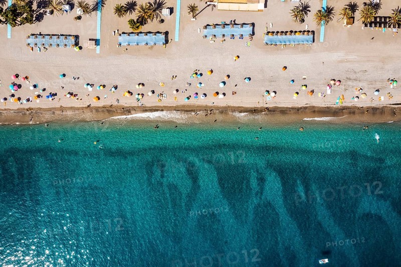 Aerial view of touristic coast in Almunecar by Mediterranean Sea