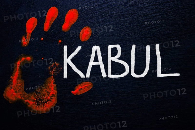 Slate with a bloody handprint and the inscription Kabul