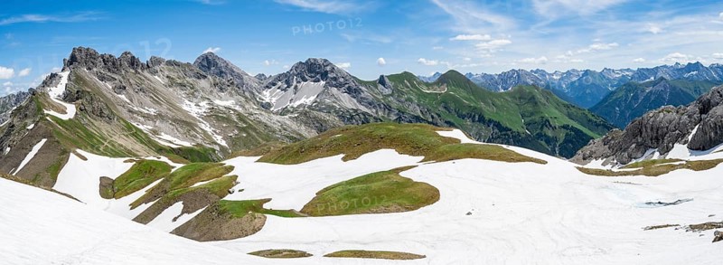 Old snow fields and mountain panorama with summit of Grosser Krottenkopf and Ramstallkopf