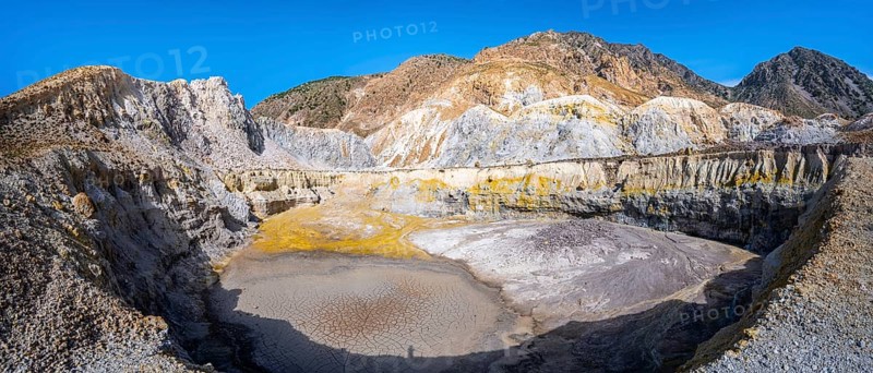 Crater with yellow discoloured sulphur stones