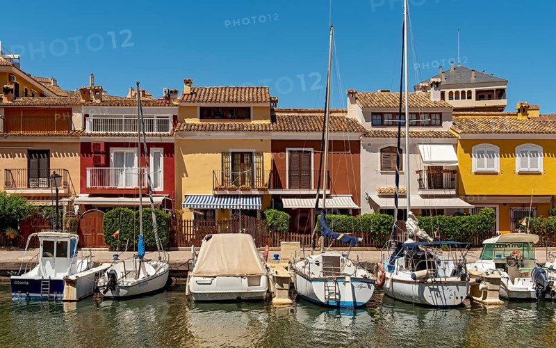 Yachts and colorful houses