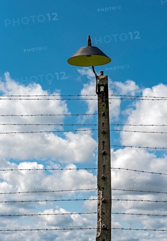 Barbed-wire fence and lamp-post at Auschwitz II-Birkenau concentration camp