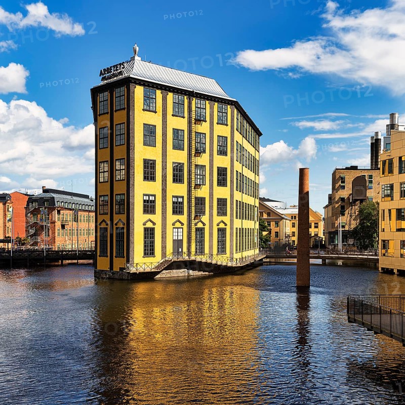 Former factory building Styrkjaern on the island of Laxholmen in the Motala stroem river