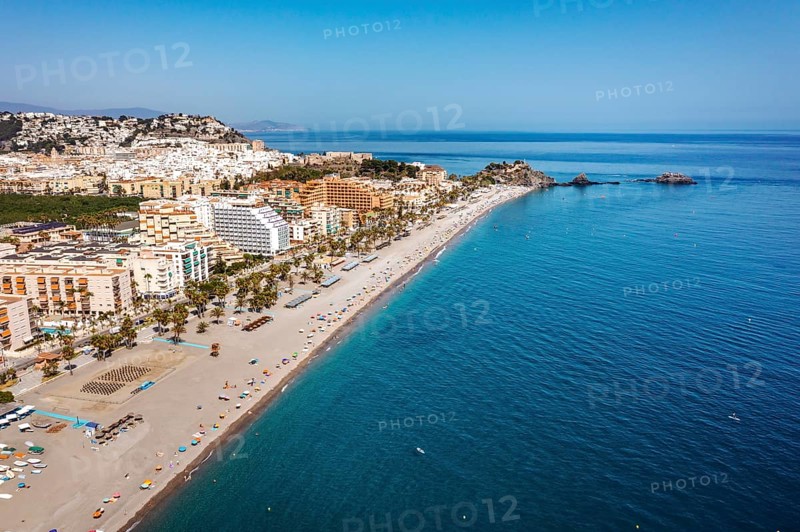 Aerial view of touristic coast in Almunecar by Mediterranean Sea