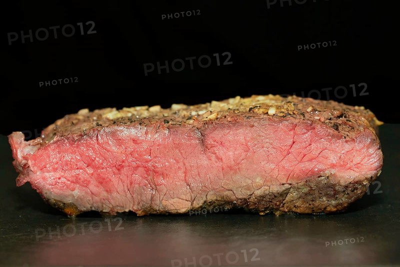 Medium roasted beef roast beef in pepper garlic coating