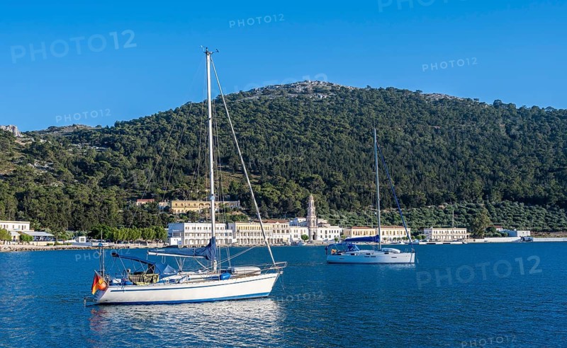 Two sailboats in the bay of Panormitis