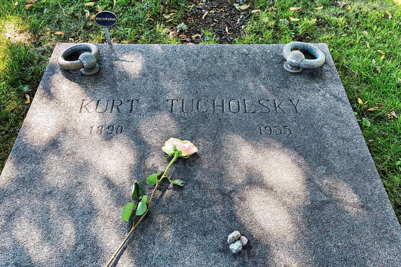 Gravestone with single rose