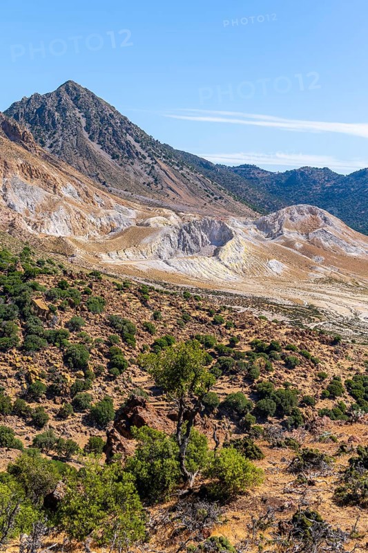 View into the caldera of colourful mineral deposits at the crater