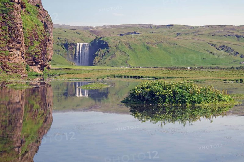 Masses of water plunge vertically into the depths