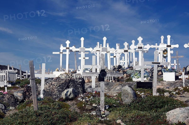 Wooden crosses in barren landscape